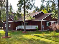 This MAIN LEVEL LIVING home provides plenty of space and a very nice 1+ acre of land just 5 miles from downtown Sandpoint.