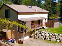 Located just 8.5 miles from downtown Sandpoint, this 3 bedroom / 2.5 bathroom 2892 square foot home on 5 private acres.